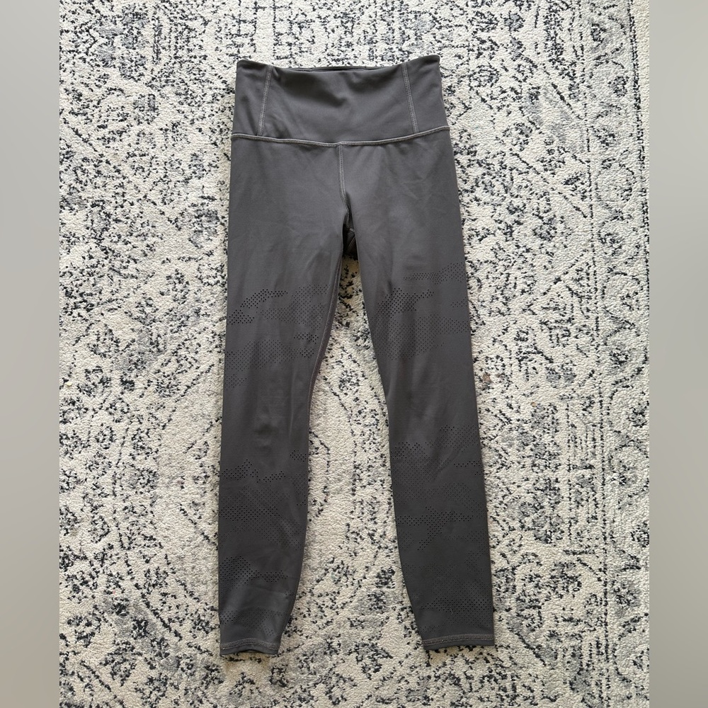 Athleta laser cut 7/8 tights in brown size xs